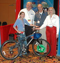 Photo of Lyndsey Jelenik being Awarded a New Bike