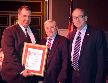 Photo of NJ State Board of Agriculture President Richard Norz and Secretary Fisher presenting Kupcho with his award
