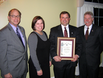 Photo of Secretary Fisher, Stacy Melick, John Melick and Scott Ellis