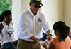 NJDA Secretary Fisher serving lunch to about 65 students participating in the NJDA Summer Food Service Program at Pennington Park in Paterson