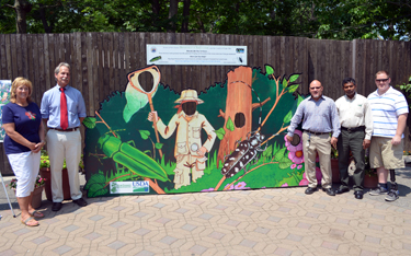 Photo of NJDA, USDA, State and County officials at the invasive pest display