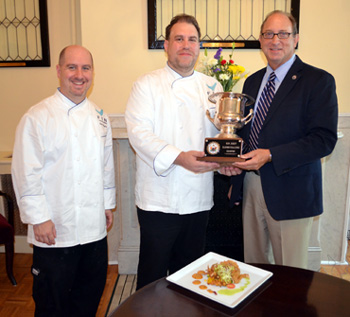 Photo of Sous Chef Al Hughes, Chef Demetrios Haronis and Secretary Fisher with the NJTop Seafood Chef Award