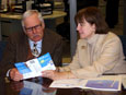 Photo of President Jeanne M. Fox with Ted Turner