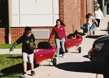 Students with kayaks