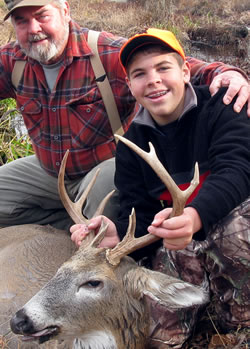 Youth with deer and grandfather