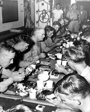 William F. Halsey, JR. dining with crew, 1944