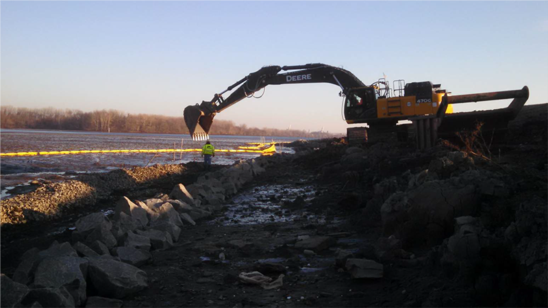 photo-Heavy equipment constructing shoreline stabilization
