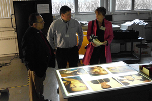 NJ State Board of Education member Jack Fornaro tours the cosmetology lab at Union County Vocational Technical Schools.