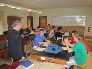 Acting Education Commissioner Chris Cerf visits a science class learning about eletricity