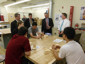 Glen Rock Science Students explain the lesson to acting Education Commissioner Chris Cerf, Superintendent David Verducci and Principal Edward Thompson .