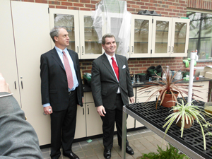 Superintendent David Verducci shows acting Education Commissioner Chris Cerf the greenhouse room