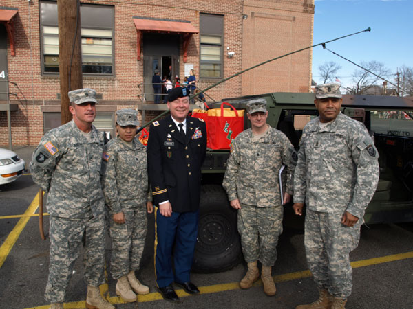 From left to right, Sgt. 1st Class John Trainor, Spc. Mary-Colleen Sobon, both with the 117th Combat Sustainment Support Battalion, Col. Mark A. Preston, New Jersey National Guard Joint Force Headquarters, Lt. Col. Paul Rumberger, commander 117th CSSB and Command Sgt. Maj. Hermenegildo Devarie, command sergeant major 117th CSSB.