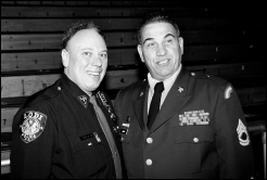 Patrolman Louis Avola, Jr. (left) and Sgt. 1st Class Joseph Manto (right)
after the 