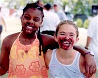 Girl with pie smash faces