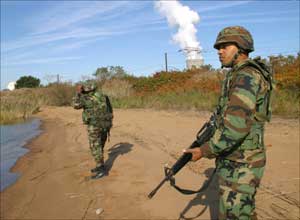 Soldiers observe form thier post