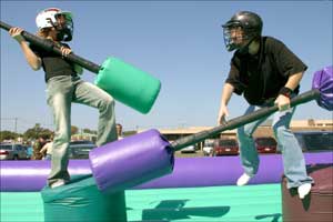 Soldiers children jousting