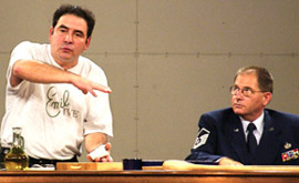 Emeril Lagasse (left) and Master Sgt. John Nicotra (right) during the
                taping of the Thanksgiving with our Troops show at McGuire Air
                Force Base. Photo courtesy 305th Air Mobility Wing Mulitmedia
                Center.