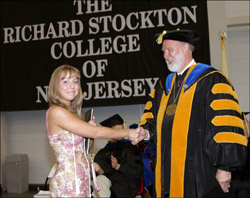 Daughter Accepts Deployed Guardsman's College Degree