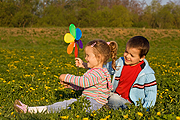 seasonal/winter_mom_son.jpg or spring_kids_pinwheel
