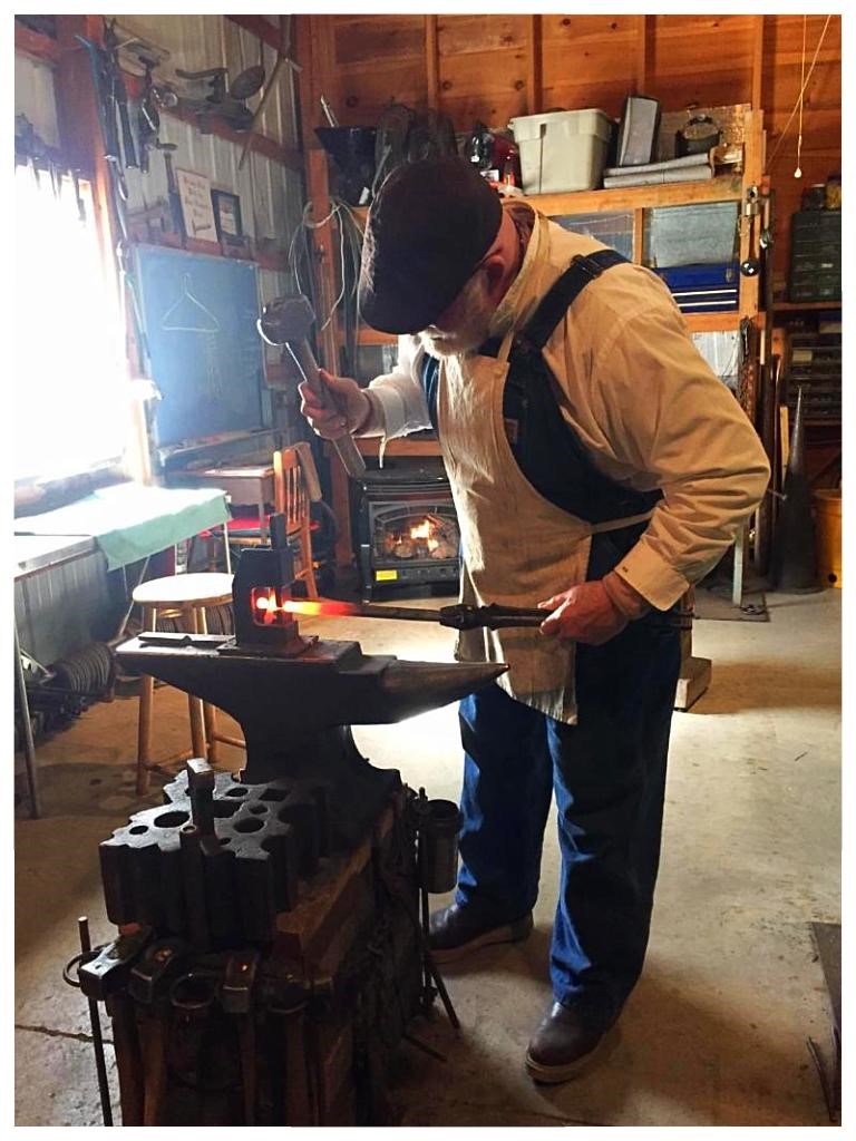 Master Blacksmith, Toby Kroll, forging at his Three Cedars Forge shop in Bridgeton, NJ.