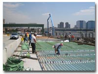 The epoxy coated reinforcing steel is installed for the concrete deck on the 14th Street Viaduct photo.