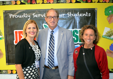 Photo of Secretary Fisher with Ceres School Principal Velez and Health Teacher Linda Kovalsky