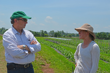 Photo of Secretary Fisher and Jess Niederer at Chickadee Creek farm