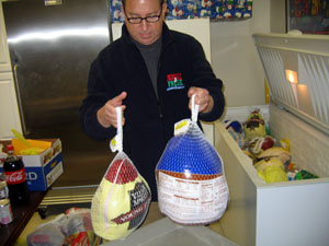 Secretary Fishers distributes turkeys at Family Service Food Pantry