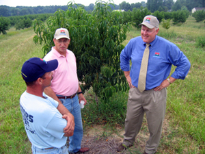 Photo of Ed Gaventa, Assemblyman Doug Fisher, and Secretary Kuperus