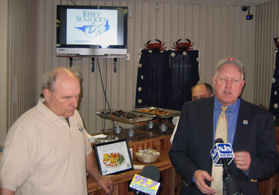 Photo of Jim Lovgren and Secretary Kuperus speaking about the benefits of the Jersey Seafood Branding Program - Click to enlarge