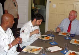 Photo of Erik Weatherspool, Peter Fischbach and Secretary Kuperus enjoying the dish - Click to enlarge