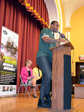 Photo of Bret Lockett speaking at the Passaic Eat Right, Move More Program