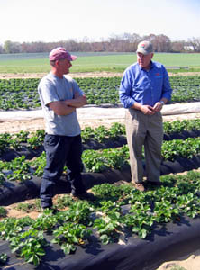 Photo of Secretary Kuperus with Brian Porch at his farm in Pedricktown