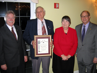 Photo of Scott Ellis, Peter Staats, Carol Staats and Secretary Fisher