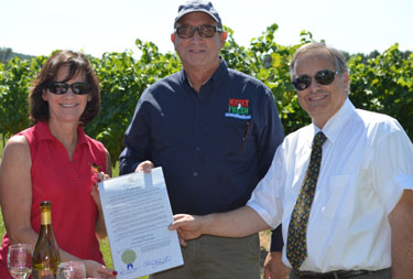 Photo of Janet and John Giunco with Secretary Fisher