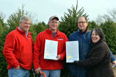 Photo of Christian Nicholson, John Wyckoff, Secretary Fisher and Commissioner Blake