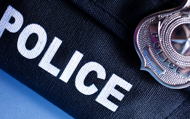 photo: police sign and badge