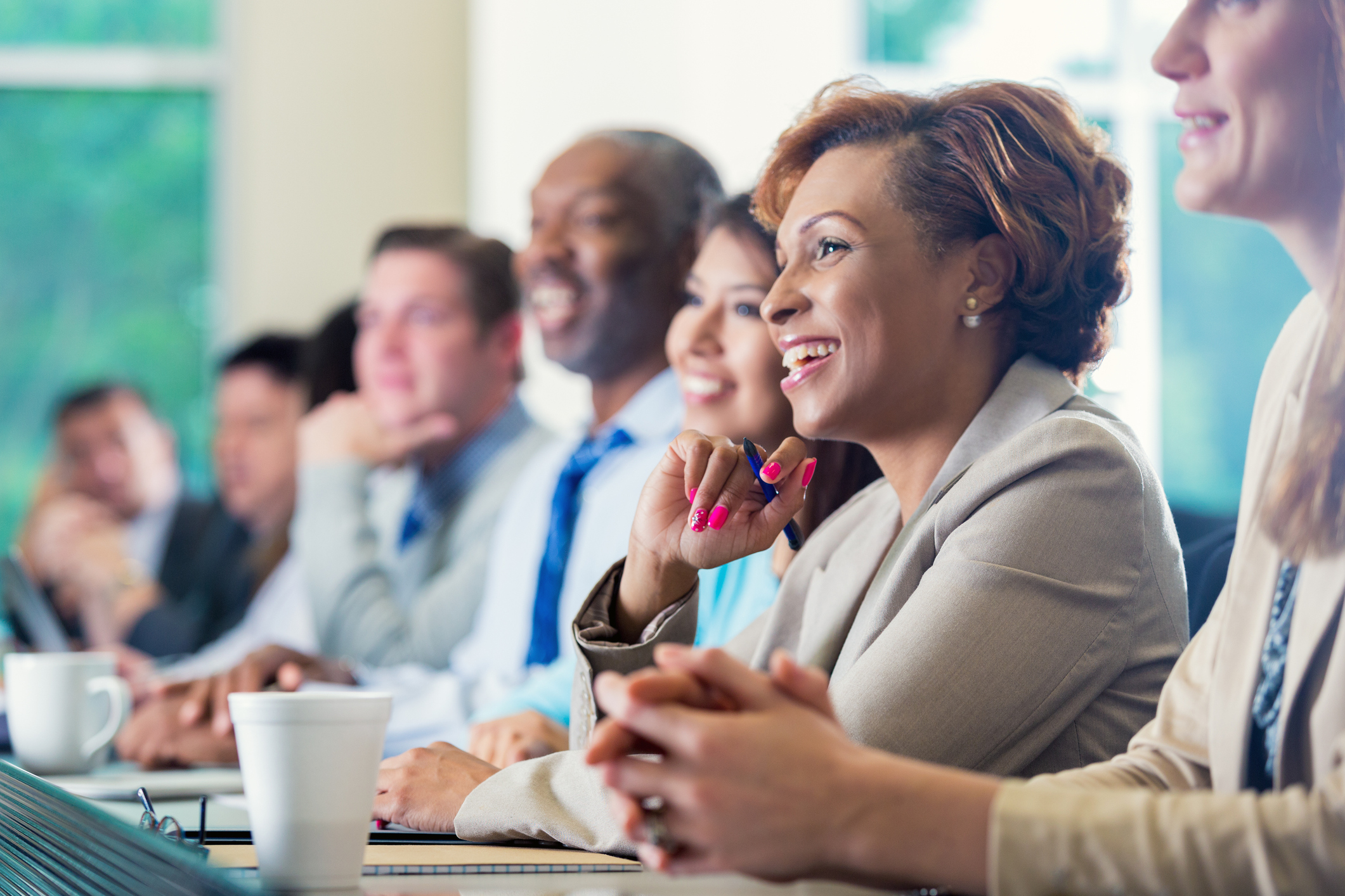  image: photo of a row of professional looking people 