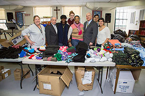 New Jersey Department of Community Affairs Commissioner Charles A. Richman and Freeholder John P. Curley thank the volunteers working at the NJ Counts event at the Jersey Shore Rescue Mission in Asbury Park.