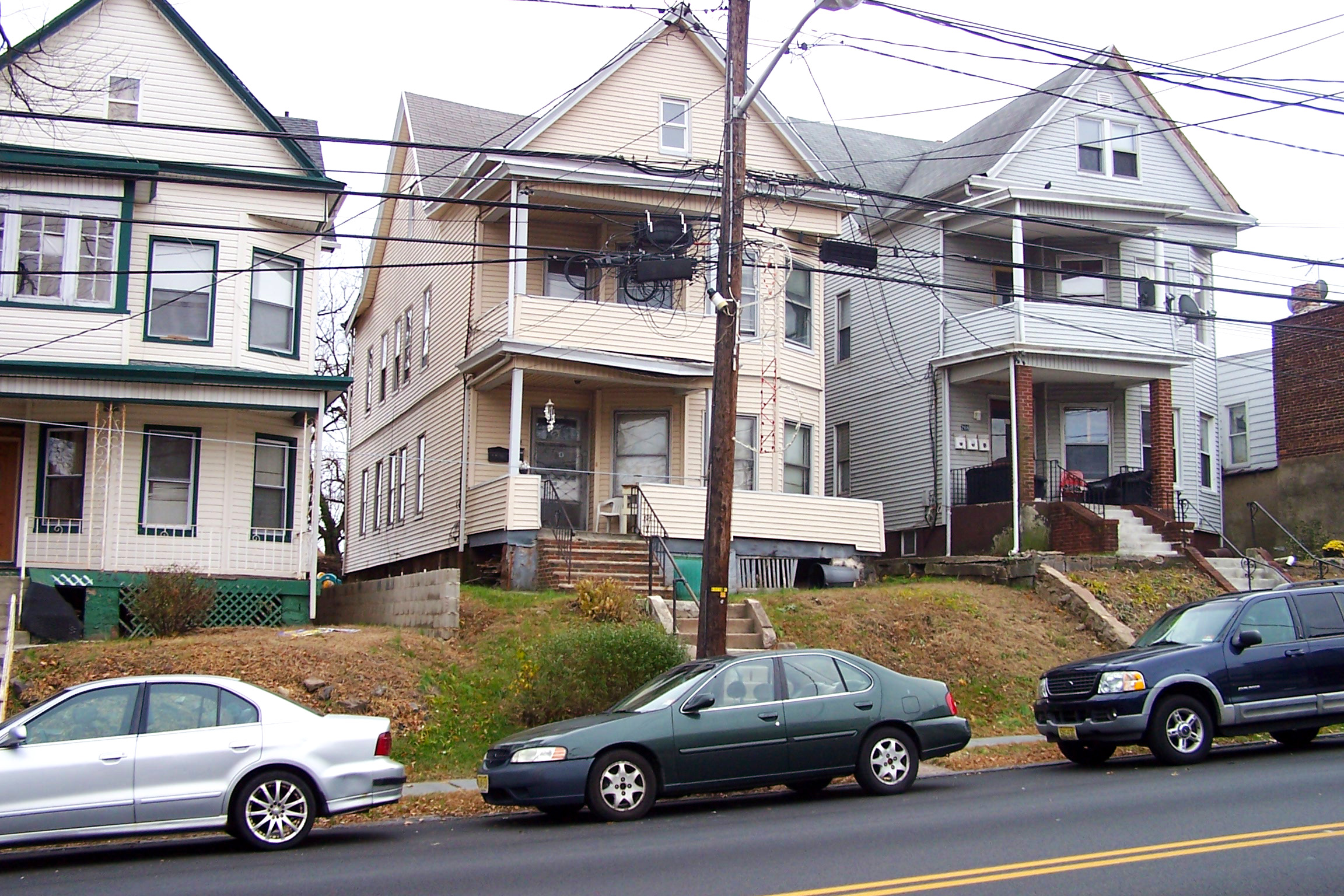 pre-1978 NJ houses in a row on a street
