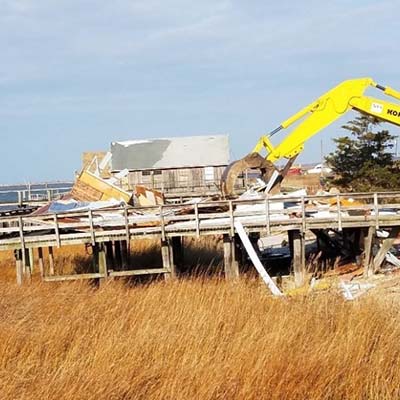 A house prone to flooding in Lawrence Township, Cumberland County, is demolished as part of the DEP’s Blue Acres program.