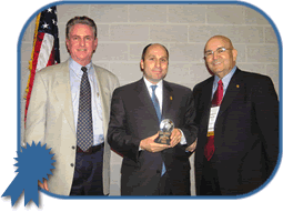 phot of Mayor Joseph Foy and Robert Schriebel with Commissioner Campbell