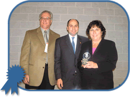photo of Robert Celeberio with Commissioners Campbell and Bass Levin