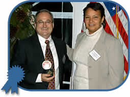 NJDEP Commissioner Lisa Jackson awards the Governor’s Environmental Excellence Award for contributions to Clean Air to Eric Niebling, General Manager of Raritan Operations, of Global Pharmaceutical Supply Group – Subsidiary of Johnson & Johnson for its efforts in reducing greenhouse gas emissions in New Jersey.