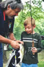 Boy admires catch