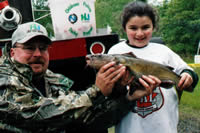 Youngster and author with catfish