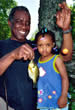 Dad, daughter and sunfish