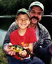 Dad, son and fish