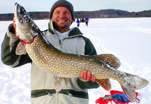 Angler with northern pike