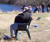 Anglers trout fishing